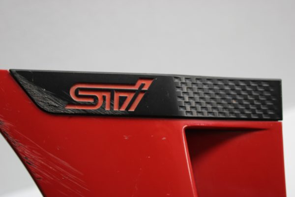 2015-2021 SUBARU WRX STI LH DRIVER SIDE FENDER GARNISH RED OEM - Image 10